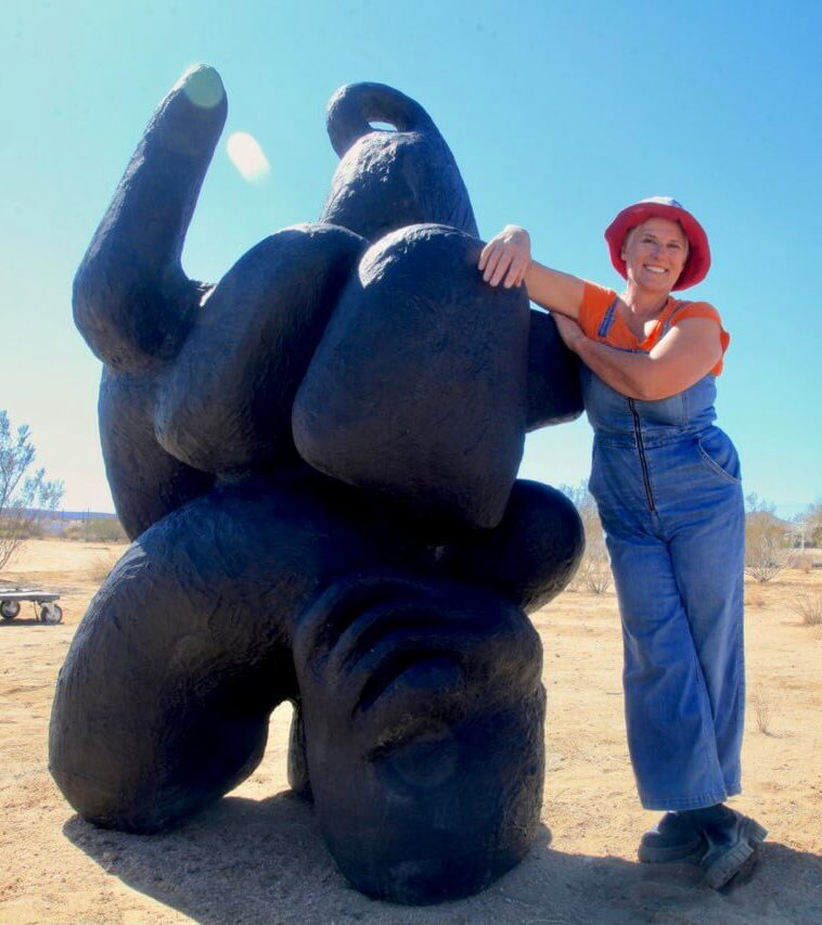 Cybele Rowe and her sculpture in Joshua Tree